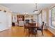 Open concept home with eat-in kitchen, dining area and a living room featuring a fireplace and plenty of natural light at 6404 Pulley Town Rd, Wake Forest, NC 27587