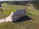 Exterior aerial view of large brick home showing the private rear yard at 6404 Pulley Town Rd, Wake Forest, NC 27587