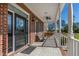 Spacious covered front porch offering ample seating and views at 6404 Pulley Town Rd, Wake Forest, NC 27587