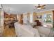 Cozy living area with hardwood floors, open floor plan, fireplace, and plenty of natural light at 6404 Pulley Town Rd, Wake Forest, NC 27587