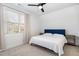 This cozy bedroom features natural light and a comfortable queen bed at 727A Peyton Ave, Durham, NC 27703