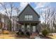 Charming two-story home with inviting front porch and American flag displayed at 727A Peyton Ave, Durham, NC 27703