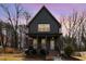 Charming two-story home with inviting front porch and American flag displayed at 727A Peyton Ave, Durham, NC 27703