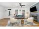 Bright living room with hardwood floors, fireplace, and comfortable seating arrangement at 727A Peyton Ave, Durham, NC 27703