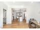 Bright and airy living room flows into dining area and kitchen, perfect for entertaining at 727A Peyton Ave, Durham, NC 27703