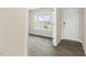 Entryway with durable flooring and front door at 871 Forth Ct, Gibsonville, NC 27249