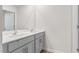 Bright bathroom featuring a double sink vanity with quartz countertop at 879 Forth Ct, Gibsonville, NC 27249