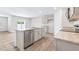 Modern kitchen featuring stainless steel appliances, granite countertops, a center island, and bright lighting at 880 Forth Ct, Gibsonville, NC 27249