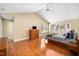 Spacious bedroom featuring hardwood floors, vaulted ceiling, and great natural light at 9344 Palm Bay Cir, Raleigh, NC 27617