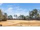 Expansive view of the well-maintained golf course, providing a picturesque backdrop for the property at 9344 Palm Bay Cir, Raleigh, NC 27617