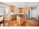 Well-equipped kitchen with stainless steel appliances and a functional kitchen island at 9344 Palm Bay Cir, Raleigh, NC 27617
