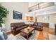 Spacious living room with hardwood floors, a gallery and open view to second story at 9344 Palm Bay Cir, Raleigh, NC 27617