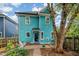 Backyard featuring a cozy patio area and a view of the two-story home at 101 N Bloodworth St, Raleigh, NC 27601