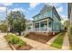 Inviting two-story home featuring a spacious front porch and classic architectural details at 101 N Bloodworth St, Raleigh, NC 27601
