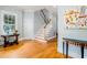 Bright foyer with hardwood floors and staircase at 101 N Bloodworth St, Raleigh, NC 27601