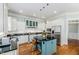 Modern kitchen boasts stainless steel appliances, an island, and a sleek design at 101 N Bloodworth St, Raleigh, NC 27601