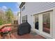 A spacious deck great for entertaining, featuring sliding glass doors and barbecue grill area at 1033 Leatherstone Ln, Fuquay Varina, NC 27526
