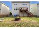 Home's outdoor space with fire pit and deck at 1033 Leatherstone Ln, Fuquay Varina, NC 27526