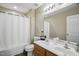 Bathroom offers double sinks and a shower/tub combination at 1033 Leatherstone Ln, Fuquay Varina, NC 27526