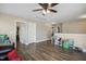 Large bonus room with vinyl floors, neutral paint and multiple doorways at 1033 Leatherstone Ln, Fuquay Varina, NC 27526