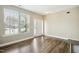 Well-lit office featuring hardwood floors, large windows, and plenty of natural light at 1033 Leatherstone Ln, Fuquay Varina, NC 27526