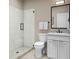 Modern bathroom with a glass-enclosed shower, white vanity, and sleek fixtures at 1035 Zelkova Lane Ln, Chapel Hill, NC 27517