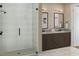 Modern bathroom with a glass-enclosed shower and double sink vanity at 1035 Zelkova Lane Ln, Chapel Hill, NC 27517