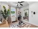 Brightly lit exercise room with modern equipment, a large mirror, and natural light at 1035 Zelkova Ln, Chapel Hill, NC 27517