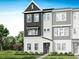 New townhome features a modern facade, neatly landscaped yard, and a welcoming entrance at 1035 Zelkova Lane Ln, Chapel Hill, NC 27517