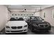 Spacious two-car garage featuring ample lighting and room for vehicles at 1035 Zelkova Lane Ln, Chapel Hill, NC 27517