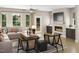 Cozy living room with a fireplace, television, comfortable seating, and modern furnishings at 1035 Zelkova Lane Ln, Chapel Hill, NC 27517