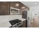 Close up of the kitchen with stainless steel appliances and granite counter tops at 1035 Zelkova Ln, Chapel Hill, NC 27517