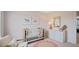 Charming Bedroom featuring a crib, a dresser, and a soft rug at 106 Craig Point Dr, Clayton, NC 27520