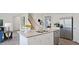 Modern kitchen featuring stainless steel appliances and a granite island, perfect for entertaining at 106 Craig Point Dr, Clayton, NC 27520