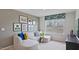 Cozy living room with comfortable sectional sofa, gallery wall, and bright natural light at 106 Craig Point Dr, Clayton, NC 27520
