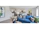 Inviting living room open to the kitchen, featuring a modern design and lots of natural light at 106 Craig Point Dr, Clayton, NC 27520
