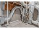 Unfinished basement with concrete walls, duct work, and mechanical systems including a furnace at 116 Pointe Park Cir, Holly Springs, NC 27540