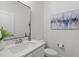 Modern bathroom featuring a sleek vanity, ample counter space, and stylish fixtures at 116 Pointe Park Cir, Holly Springs, NC 27540