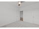 Neutral bedroom featuring carpet flooring and a large window for natural light at 116 Pointe Park Cir, Holly Springs, NC 27540