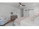 Elegant main bedroom showcasing refined decor, a comfortable armchair, and neutral tones at 116 Pointe Park Cir, Holly Springs, NC 27540