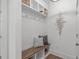 Bright mudroom with a custom storage bench and hooks, perfect for staying organized at 116 Pointe Park Cir, Holly Springs, NC 27540