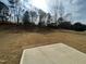 Expansive backyard with newly seeded grass and a concrete patio, perfect for outdoor living at 128 Oat Grain Ct, Clayton, NC 27520