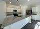 Beautiful kitchen featuring stainless appliances, granite countertops, and white cabinetry at 128 Oat Grain Ct, Clayton, NC 27520