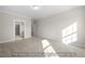 Neutral bedroom with carpet floors and natural light at 1811 Parham Dr, Graham, NC 27253