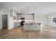 Bright and airy kitchen and dining area with hardwood floors, recessed lighting, and stainless steel appliances at 1811 Parham Dr, Graham, NC 27253