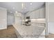 Spacious kitchen with a large island, granite countertops, stainless steel appliances, and pendant lighting at 1811 Parham Dr, Graham, NC 27253