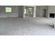 Bright living room featuring large windows and a cozy fireplace at 187 Dairymont Dr, Pittsboro, NC 27312