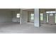 Spacious living room area with large windows offering natural light at 187 Dairymont Dr, Pittsboro, NC 27312