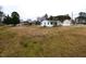 Quaint home with a well-manicured front lawn and mature trees, perfect for families at 200 Pace St, Smithfield, NC 27577