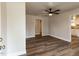 Living Room area boasting hard wood flooring, neutral walls and updated ceiling fan at 200 Pace St, Smithfield, NC 27577